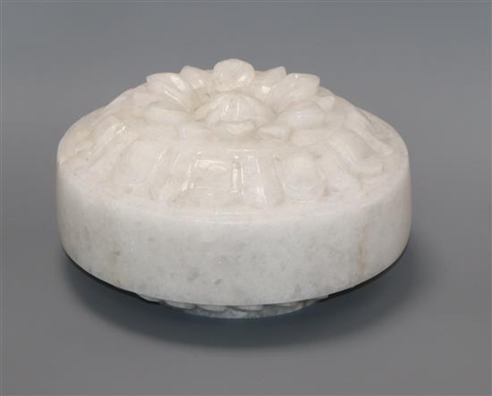 A piece of carved quartz, in a fitted box